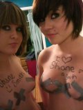 Two-emo-teens-with-duct-tape-on-their-tits
