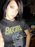 Sexy-emo-girls-strips-and-shows-her-smooth-cunt